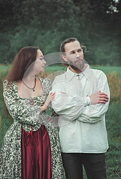 Beautiful couple man and woman in medieval costume