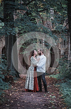 Beautiful couple man and woman in medieval costume