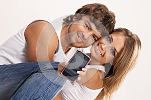 Beautiful couple with a mobile phone