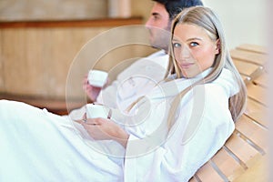 Beautiful couple relaxing together at spa centre after a beauty treatment