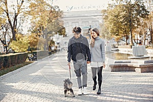 Beautiful couple spend time in a summer city