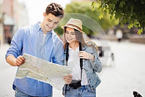 Beautiful couple traveling and sightseeing in new city