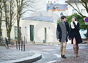 Beautiful couple walking in Paris