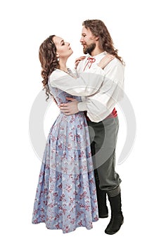 Beautiful couple woman and man in medieval clothes isolated
