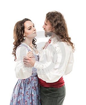 Beautiful couple woman and man in medieval clothes isolated