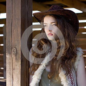 Beautiful cowgirl in hat portrait photo