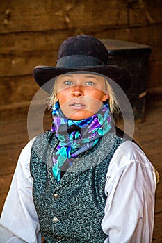Beautiful Cowgirl in Western Scene