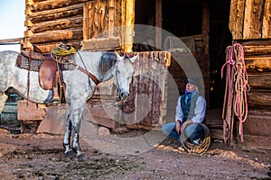 Beautiful Cowgirl in Western Scene