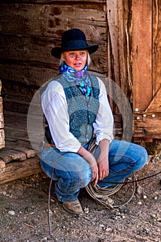 Beautiful Cowgirl in Western Scene