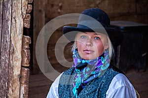 Beautiful Cowgirl in Western Scene