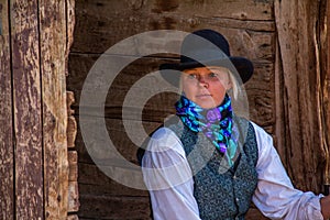 Beautiful Cowgirl in Western Scene photo