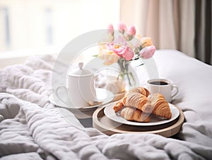 Beautiful cozy breakfast in bed, home bedroom interior with bright morning light, healthy food on decorated tray