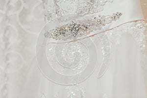 Beautiful cream wedding dress detail with flowers