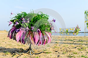 Beautiful creative bridal wedding bouquet on beach