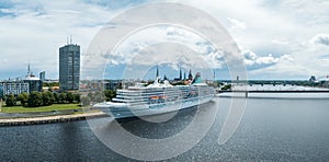 Beautiful cruise ship docked in Riga, Latvia near the old town and the bridge.