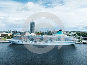 Beautiful cruise ship docked in Riga, Latvia near the old town and the bridge.