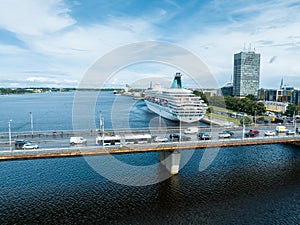 Beautiful cruise ship docked in Riga, Latvia near the old town and the bridge.