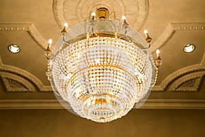 Beautiful crystal chandelier in ball room