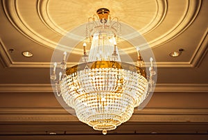 Beautiful crystal chandelier in ball room