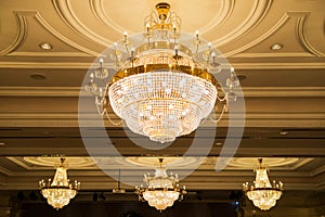 Beautiful crystal chandelier in ball room