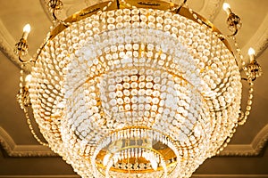 Beautiful crystal chandelier in ball room