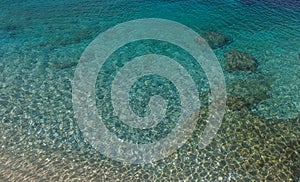 Beautiful crystal clear waters from the beach of Kassiopi, Corfu, Greece