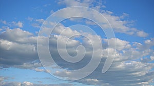 Beautiful Cumulus clouds move fast across the blue sky, Timelapse. Beauty of nature colors