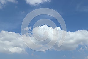 Beautiful cumulus white clouds on bright  blue skies background