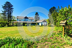 Beautiful curb appeal of large blue country house