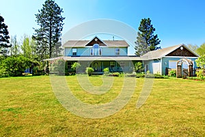 Beautiful curb appeal of large blue country house