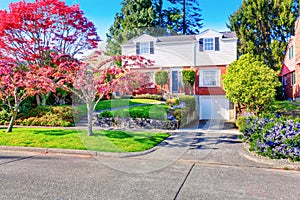 Beautiful curb appeal of two level house with one garage space.