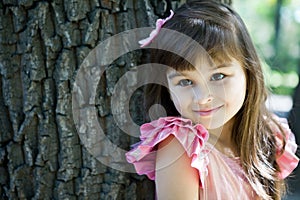 Beautiful curious girl in a park