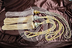 Beautiful Curtains tassel by curtain strap with sunlight for interior luxury house, Selective focus