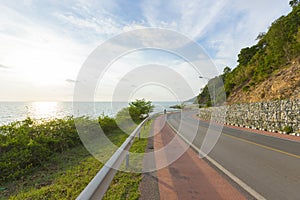 Beautiful curve road by the sea and mountain at Noen-nangphaya view point in Chanthaburi, Thailand.