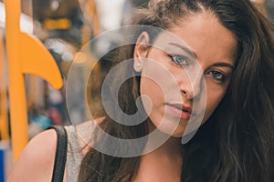 Beautiful curvy girl posing in a metro car