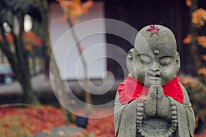 Janapese shrine cute calm praying buddha stone crafting photo