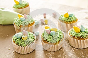 Beautiful cute Easter cupcakes with Easter decorations