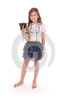 Beautiful cute happy young girl with headphones and tablet pc