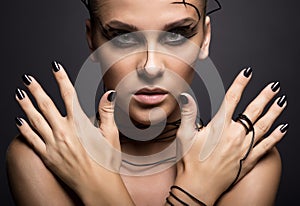 Beautiful cyber girl with linear black makeup