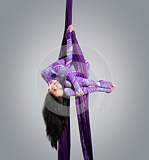 Beautiful dancer on aerial silk, aerial contortion, aerial ribbons, aerial silks, aerial tissues, fabric