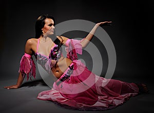 Beautiful dancer woman in bellydance costume