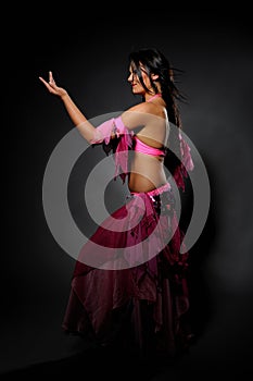 Beautiful dancer woman in bellydance costume