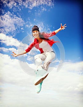 Beautiful dancing girl jumping