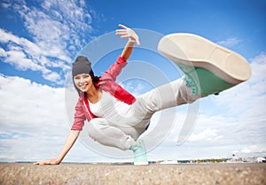 Beautiful dancing girl in movement