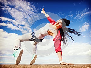 Beautiful dancing girl in movement