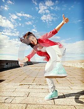 Beautiful dancing girl in movement