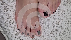 Beautiful dark colorful glitter gel polish nails pedicure video