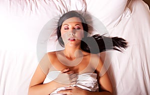 Beautiful dark hair woman sleeping