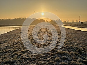 beautiful dawn in the frosty morning. the glade covered with hoarfrost