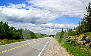 Beautiful day for a road trip: Scenic highway near Lake Superior in Ontario / Canada